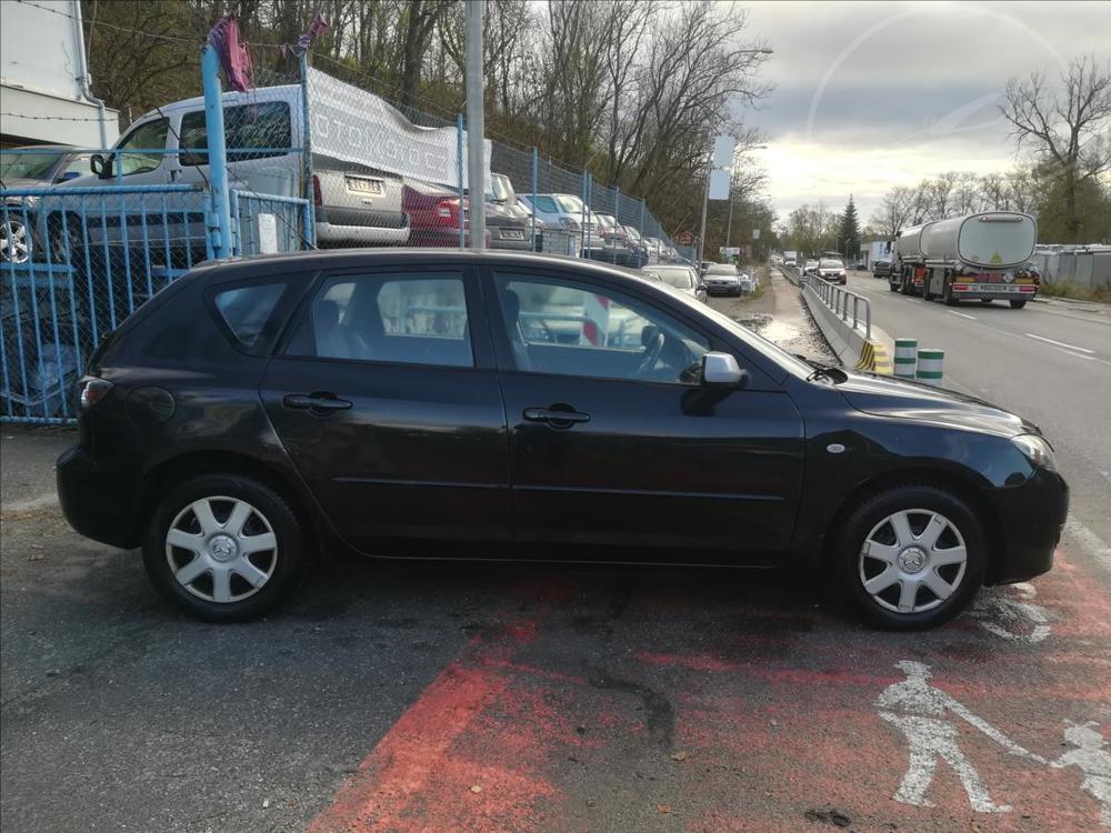 Mazda 3 1,6 i Extra