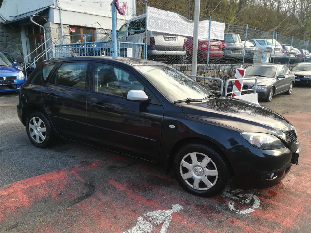 Mazda 3 1,6 i Extra