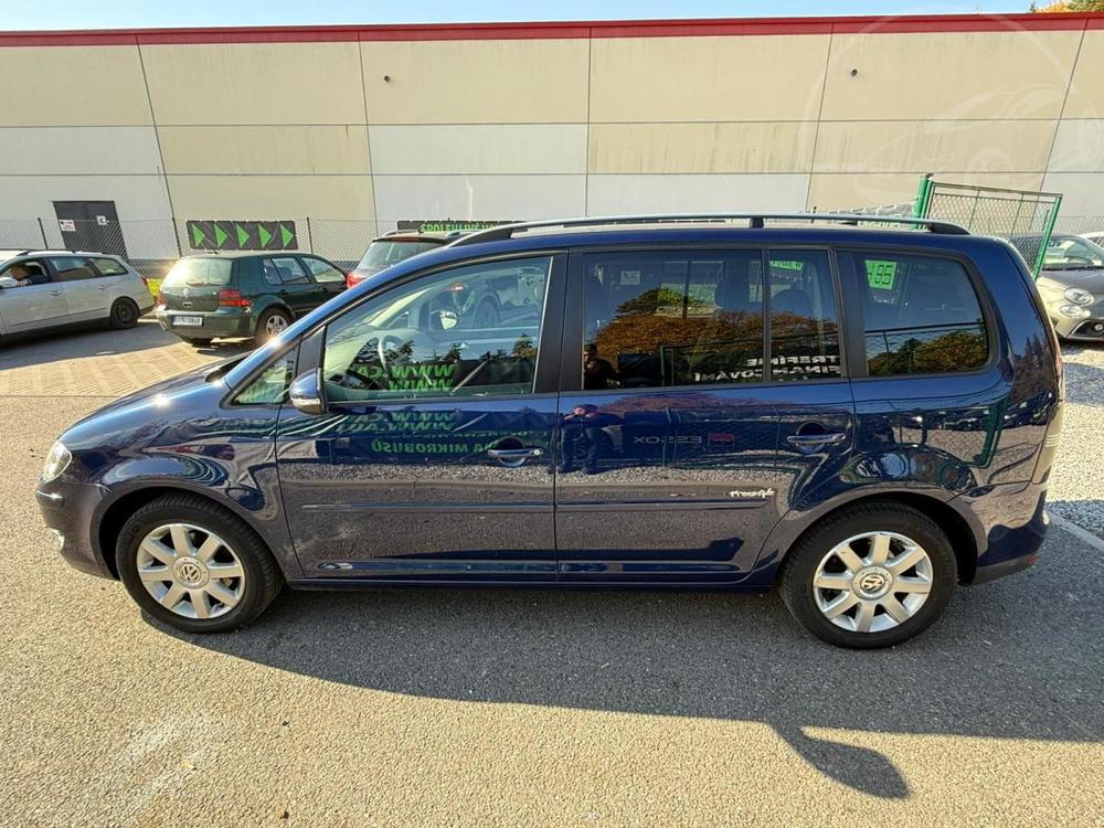 Volkswagen Touran 1,6 MPI FREESTYLE-NAVI, 7 MST